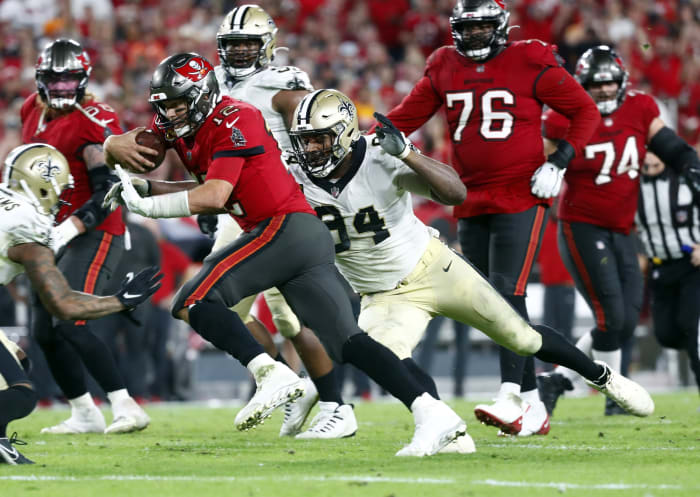 New Orleans Saints defensive end Cameron Jordan (94) tackles Tampa Bay Buccaneers quarterback Tom Brady (12) to force a fumble. Mandatory Credit: Kim Klement-USA TODAY Sports